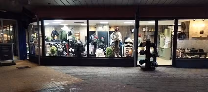 Het vraagtekentje Dames en Herenmode